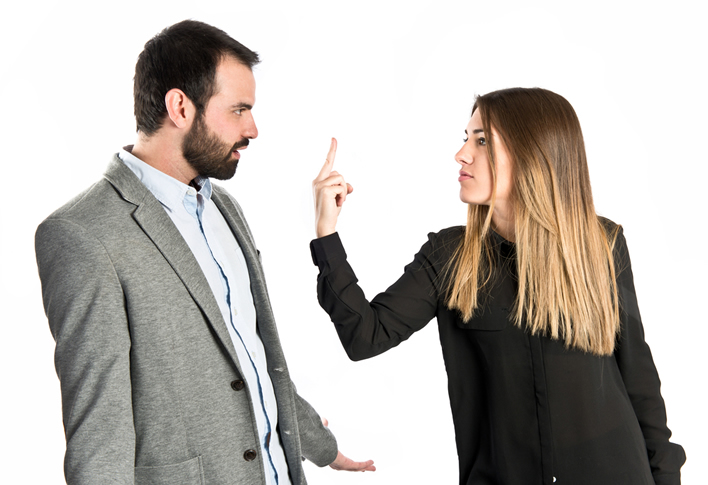 Woman telling man off with middle finger for bad compliment 